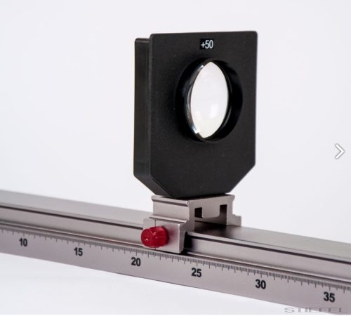 Lencse, foglalatban, f = +50 mm