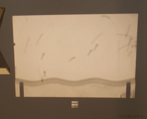 Részecskemozgás készülék írásvetítőhöz